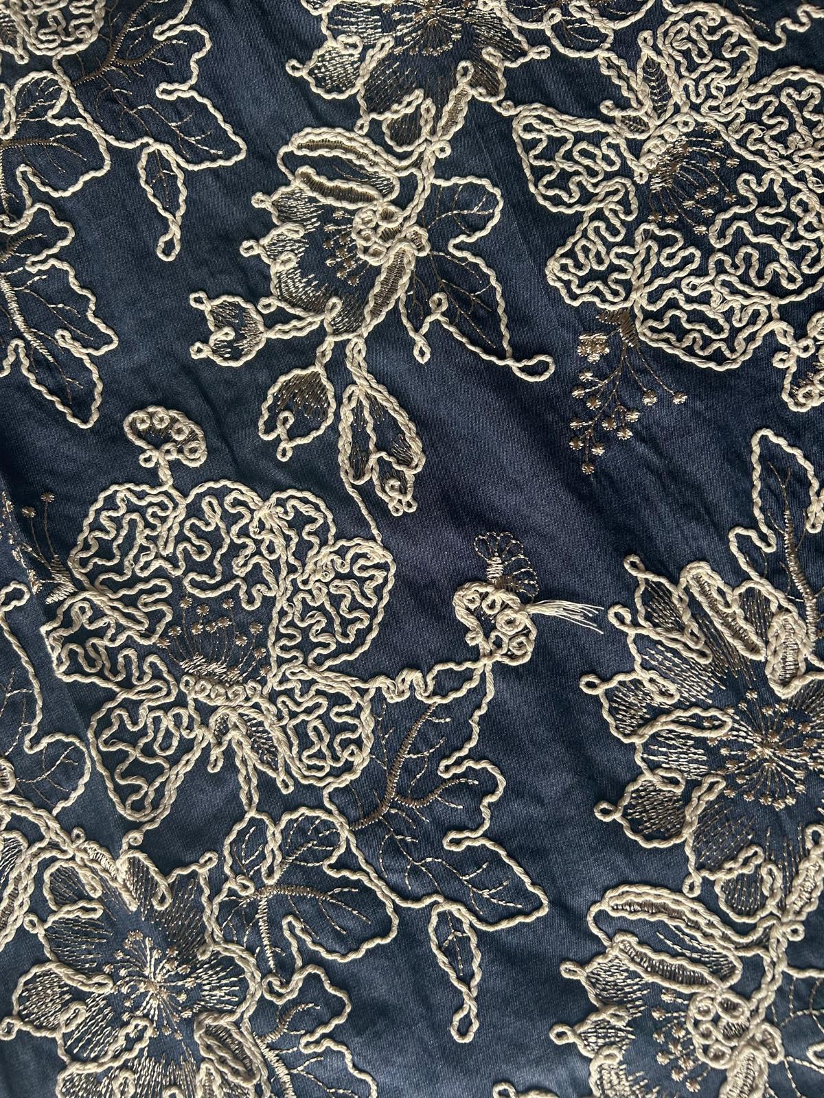 Jeans campo pieno disegno fiore raffia 2 Jeans ricamato disegno fiore raffia