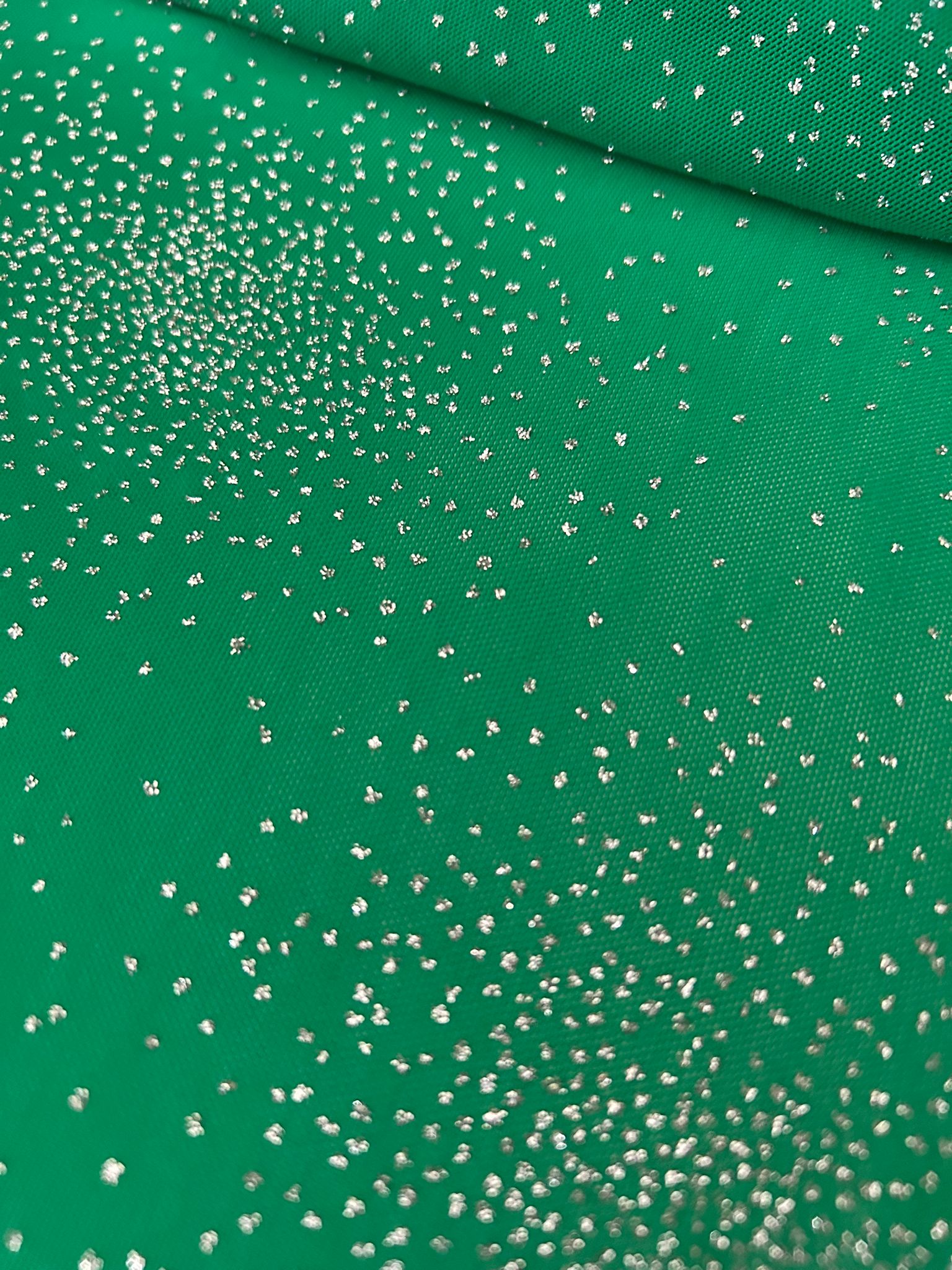 Tulle floccato glitter verde disegno polvere di stelle 1 Tulle elasticizzato floccato glitter verde disegno polvere di stelle