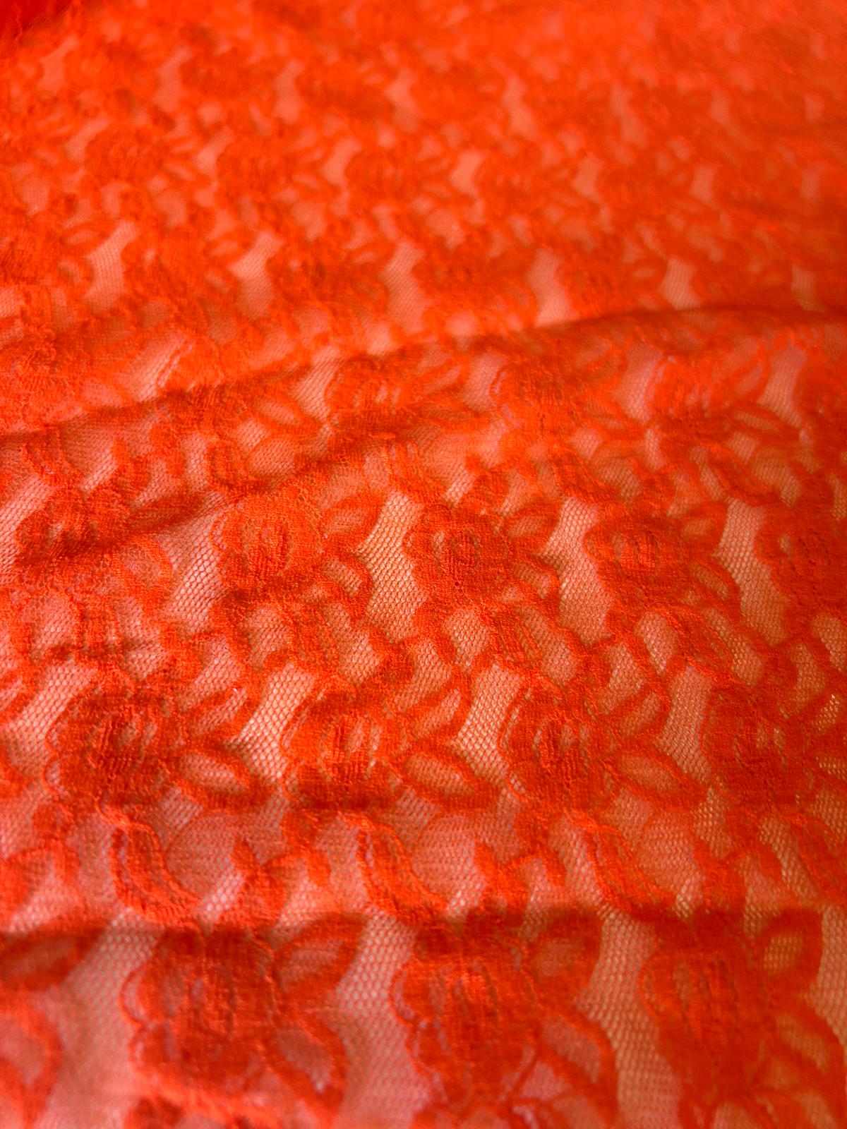 Pizzo elasticizzato disegno fiore piccolo astratto arancio fluo 3 Pizzo elasticizzato disegno fiore piccolo astratto arancio fluo - immagine 3