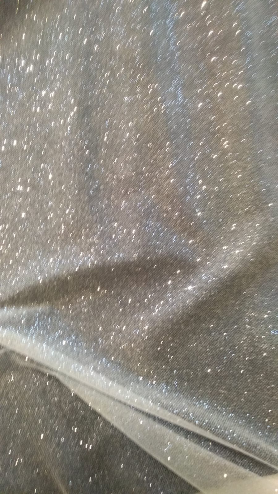 Tulle glitterato bianco seta 1 Tulle glitterato unito bianco